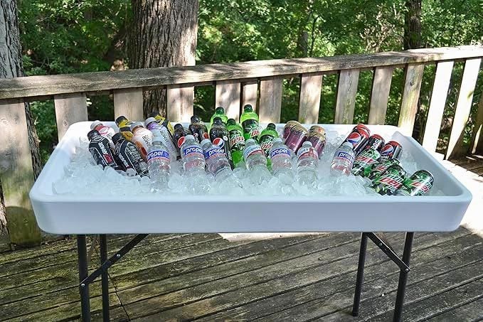 Soda and drinks kept on long cooler table in ice