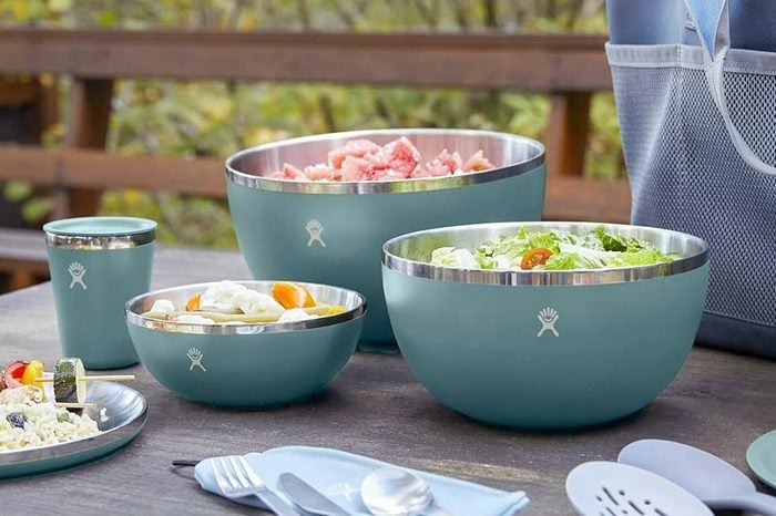 Food kept in insulated bowls placed over table